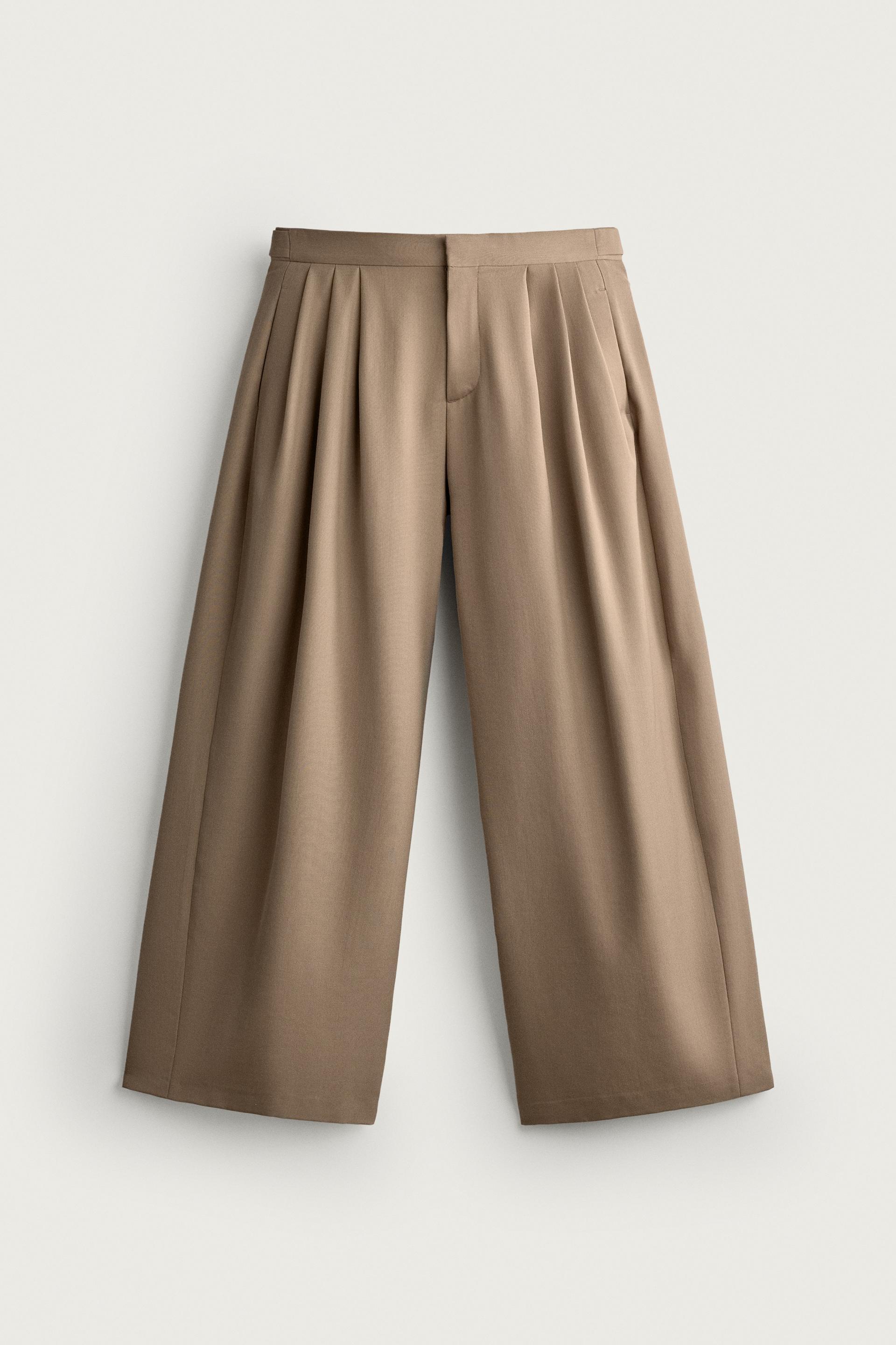 RELAXED FIT PLEATED SUIT PANTS by ZARA