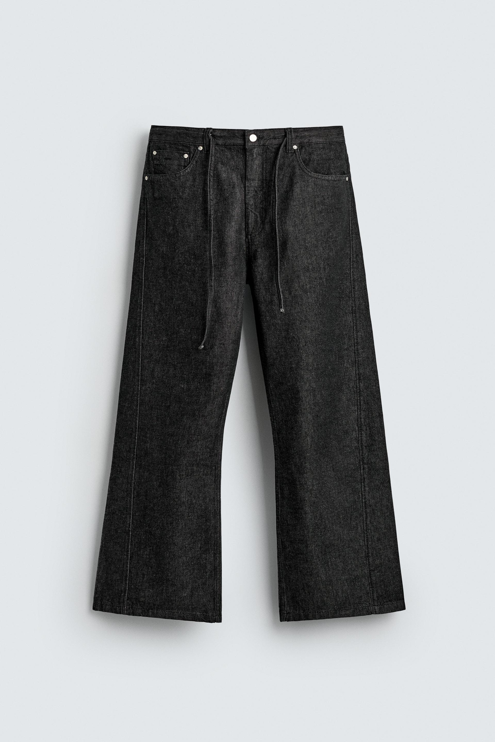 RELAXED FLARE FIT JEANS by ZARA