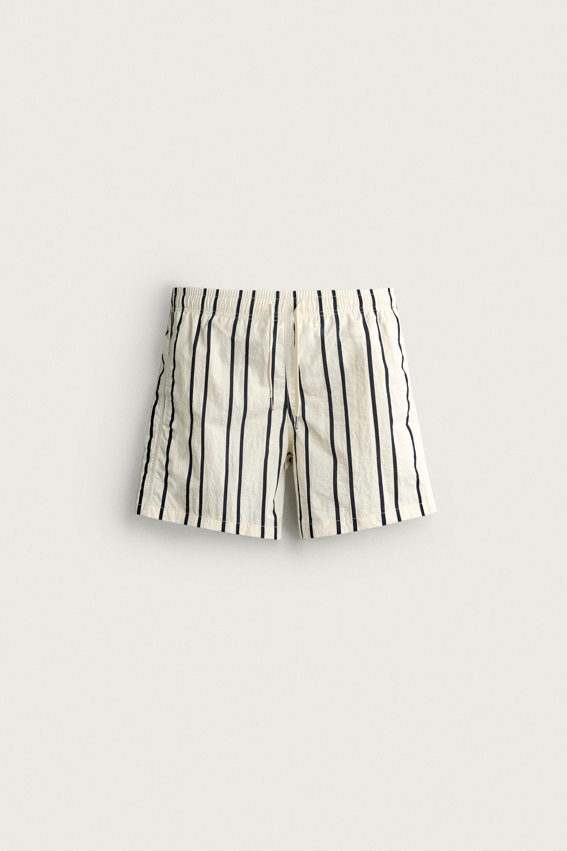 STRIPED MEDIUM-LENGTH SWIM SHORTS by ZARA