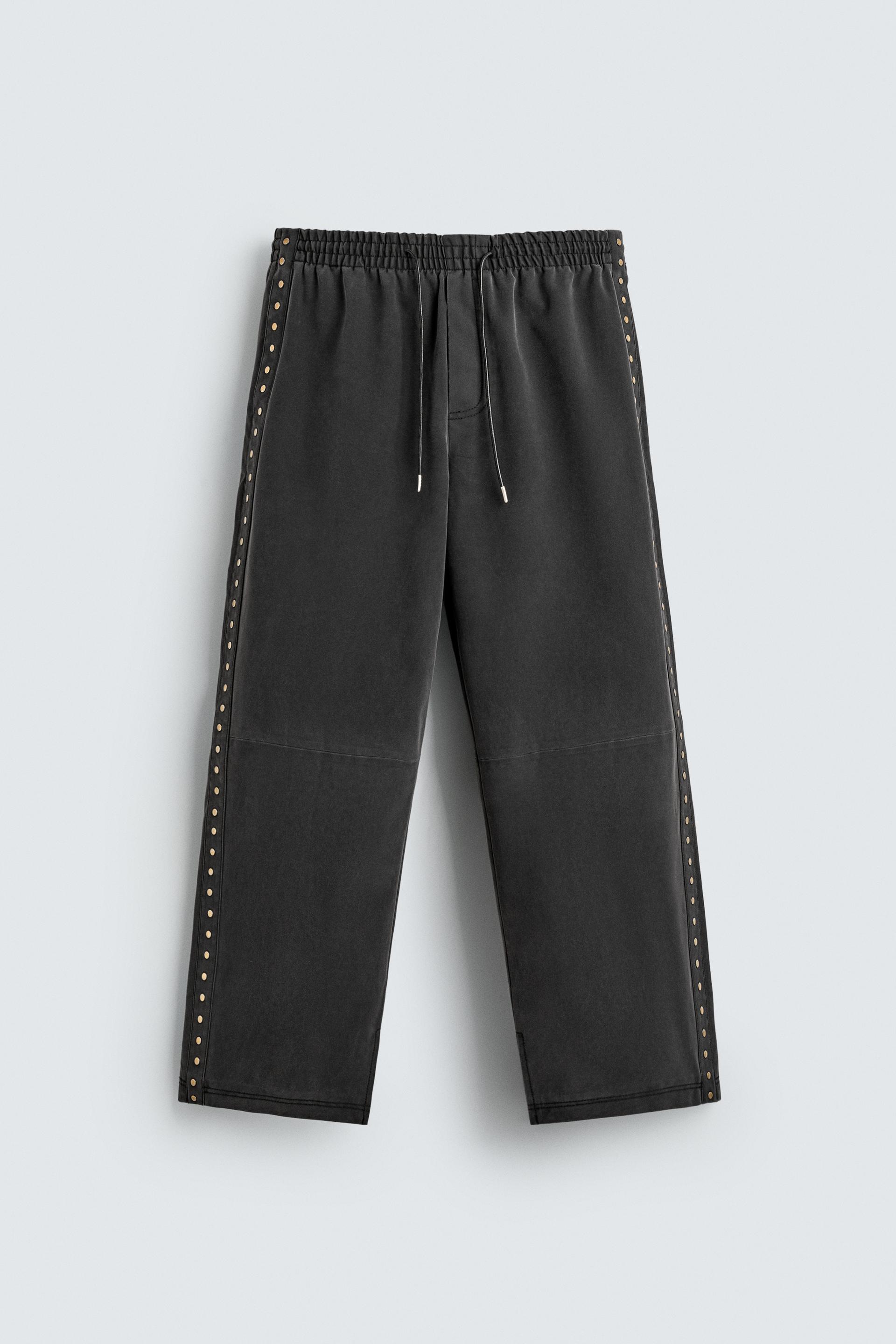 STUDDED FAUX LEATHER RELAXED FIT PANTS by ZARA