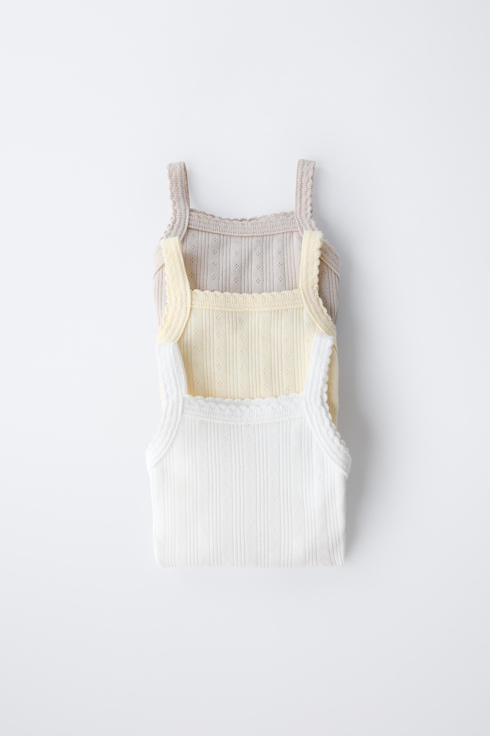 THREE-PACK OF RIB KNIT BODYSUITS WITH CUTOUT DETAIL by ZARA