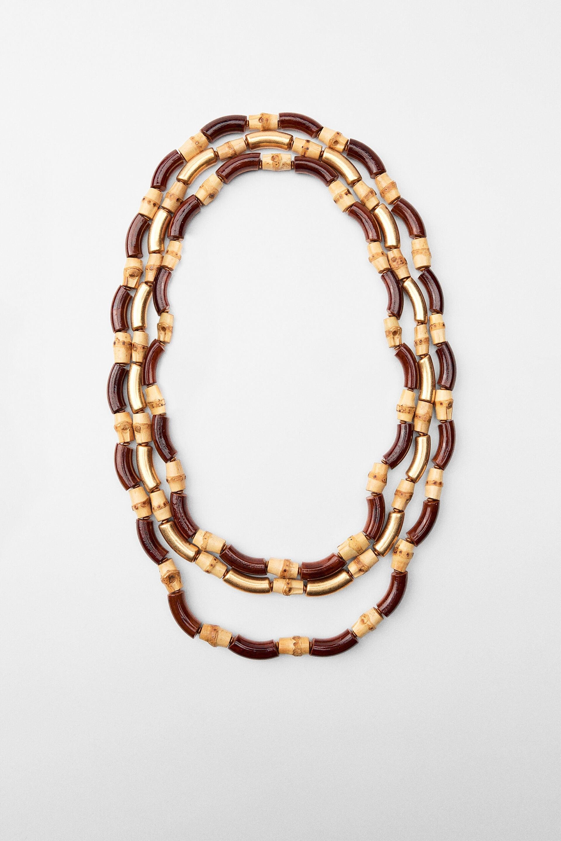 THREE PACK OF WOOD NECKLACES by ZARA