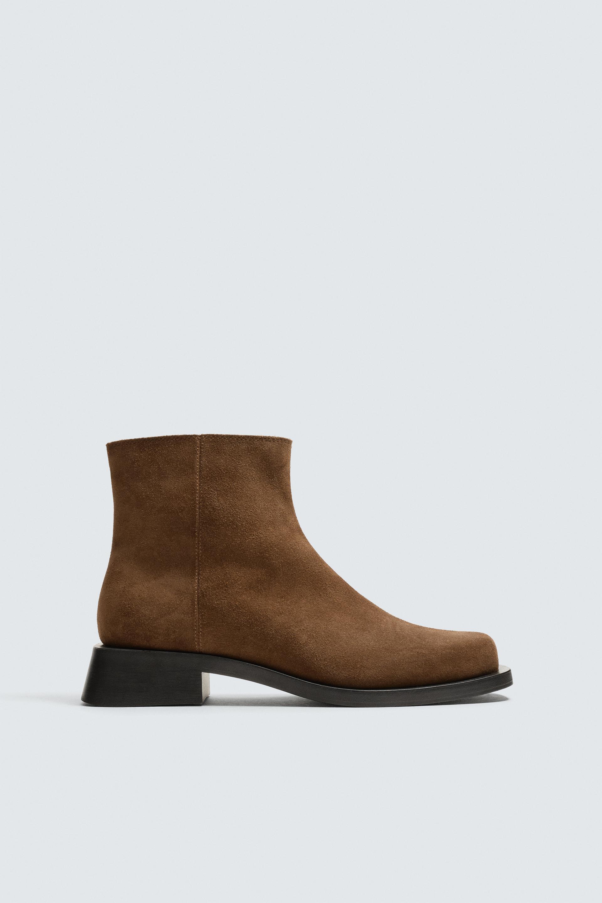 TOPSTITCHED LEATHER BOOTS by ZARA