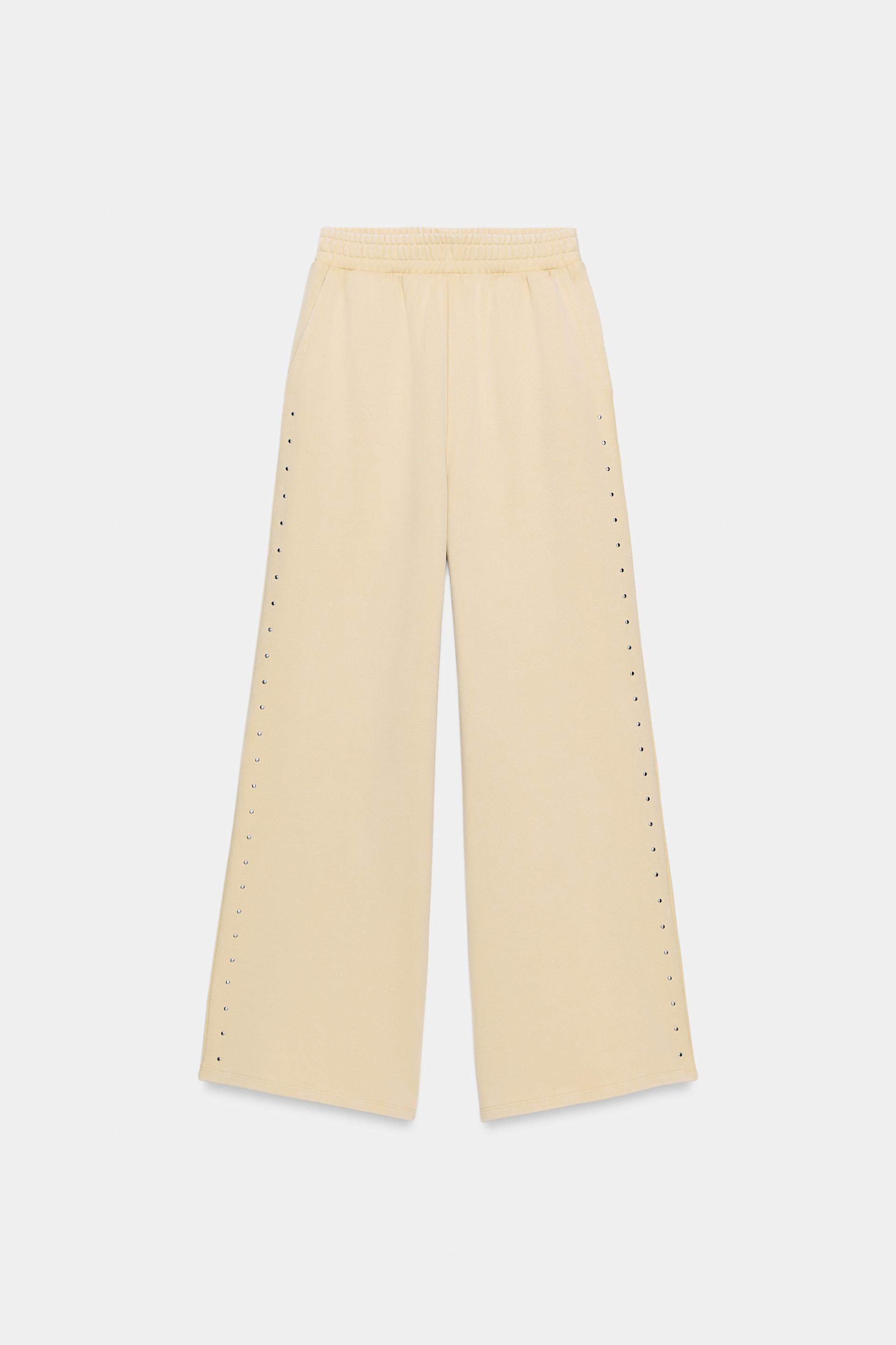 WASHED EFFECT FLEECE PANTS WITH STUDS by ZARA