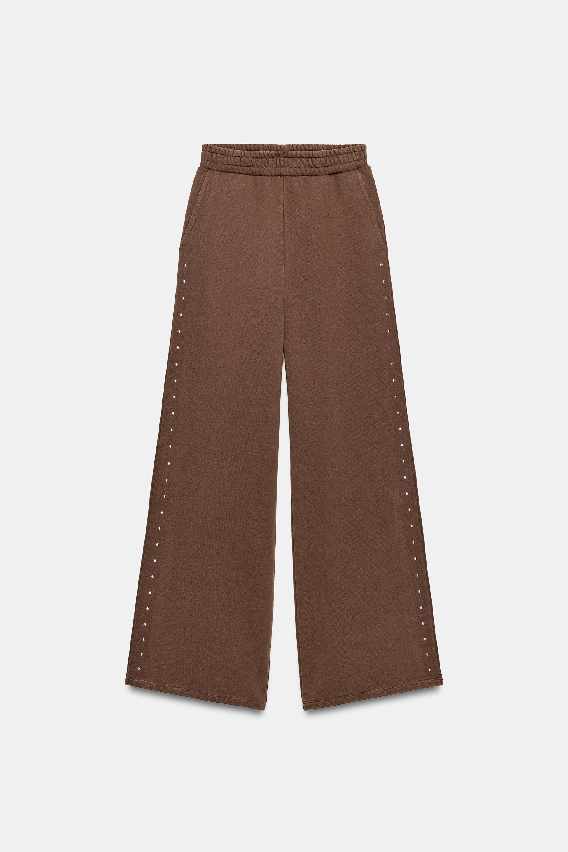 WASHED EFFECT FLEECE PANTS WITH STUDS by ZARA