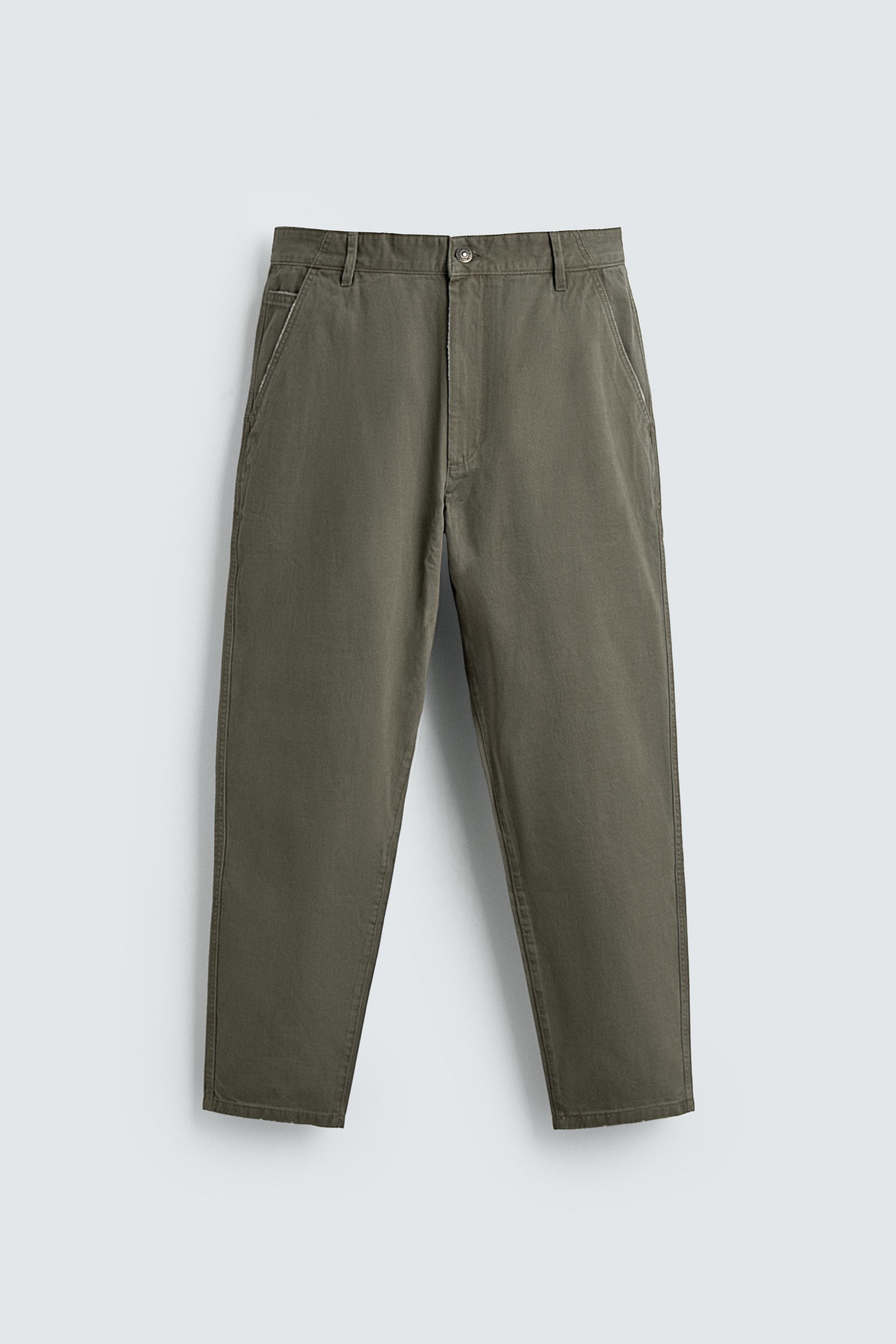 WASHED TAPERED FIT PANTS by ZARA