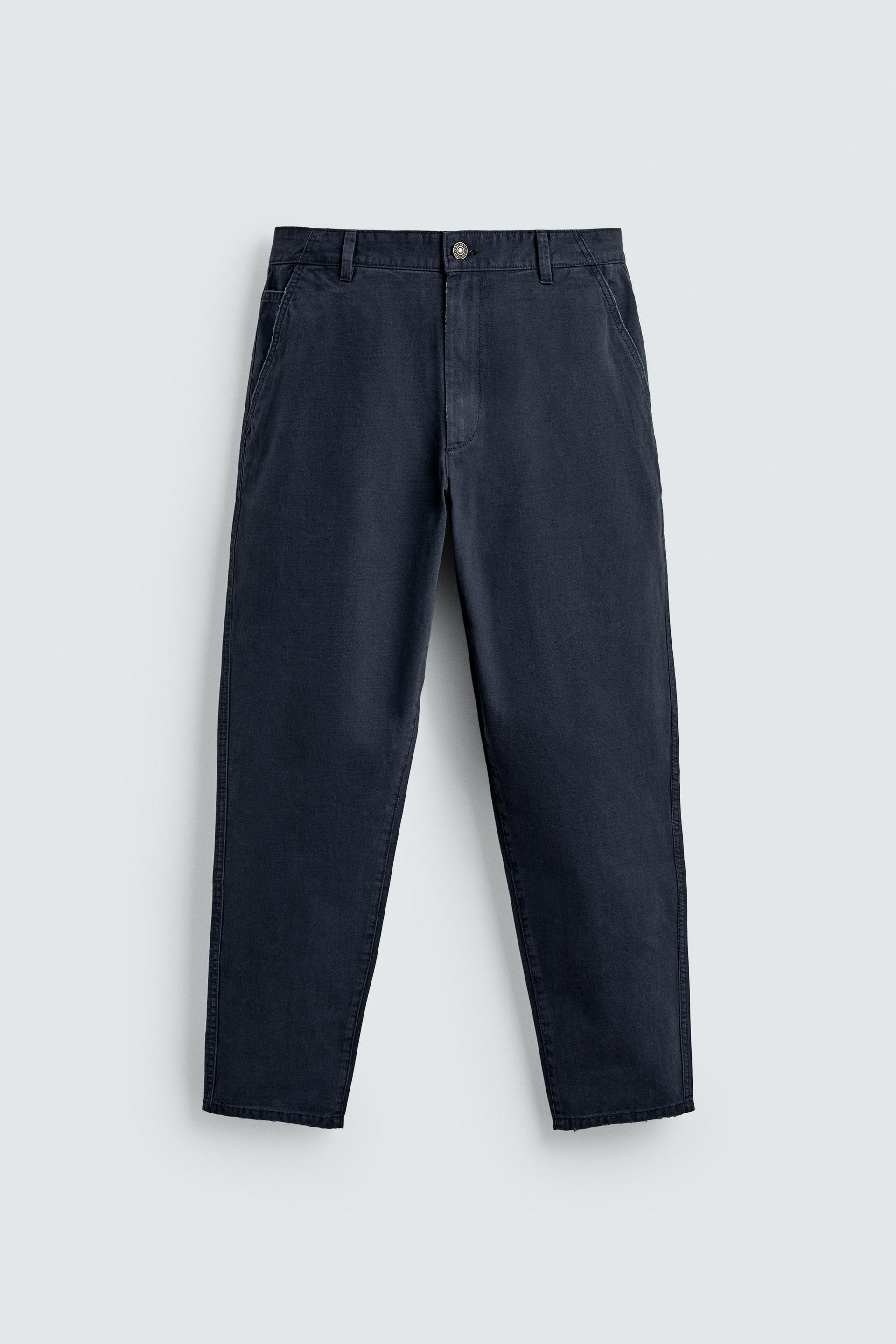 WASHED TAPERED FIT PANTS by ZARA