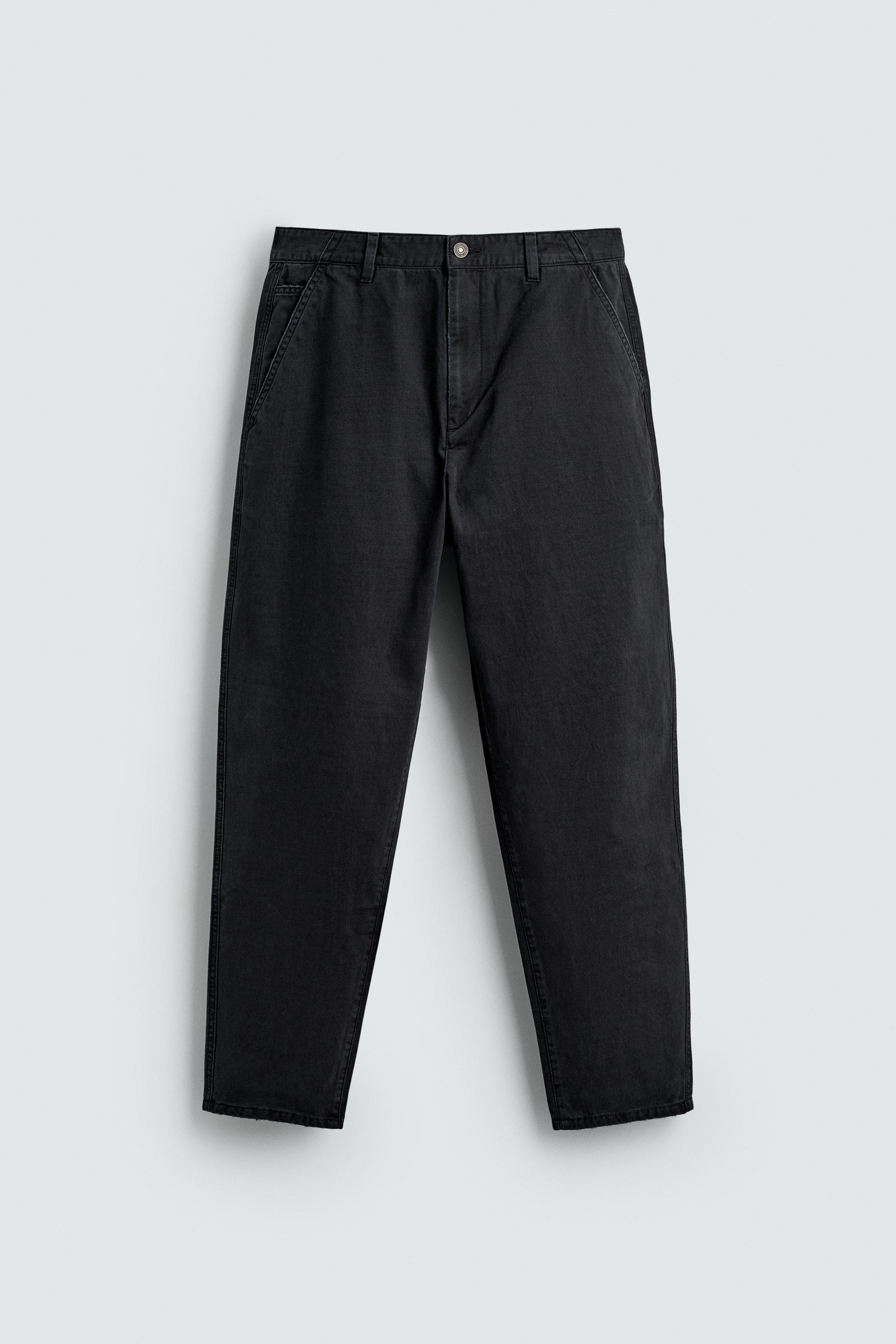 WASHED TAPERED FIT PANTS by ZARA
