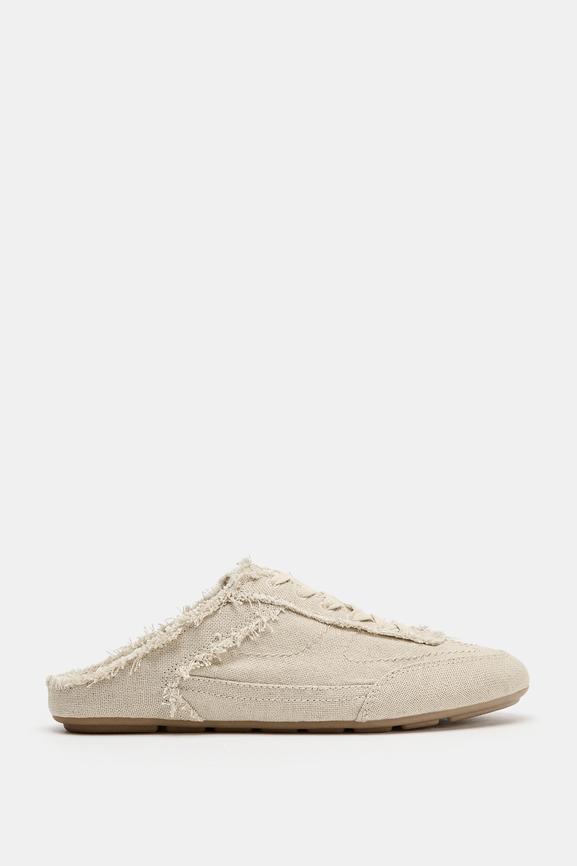 WORN-EFFECT MULE SNEAKERS by ZARA
